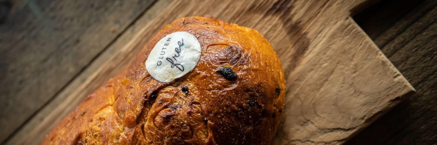 Printed edible topper used as a gluten free label on bread