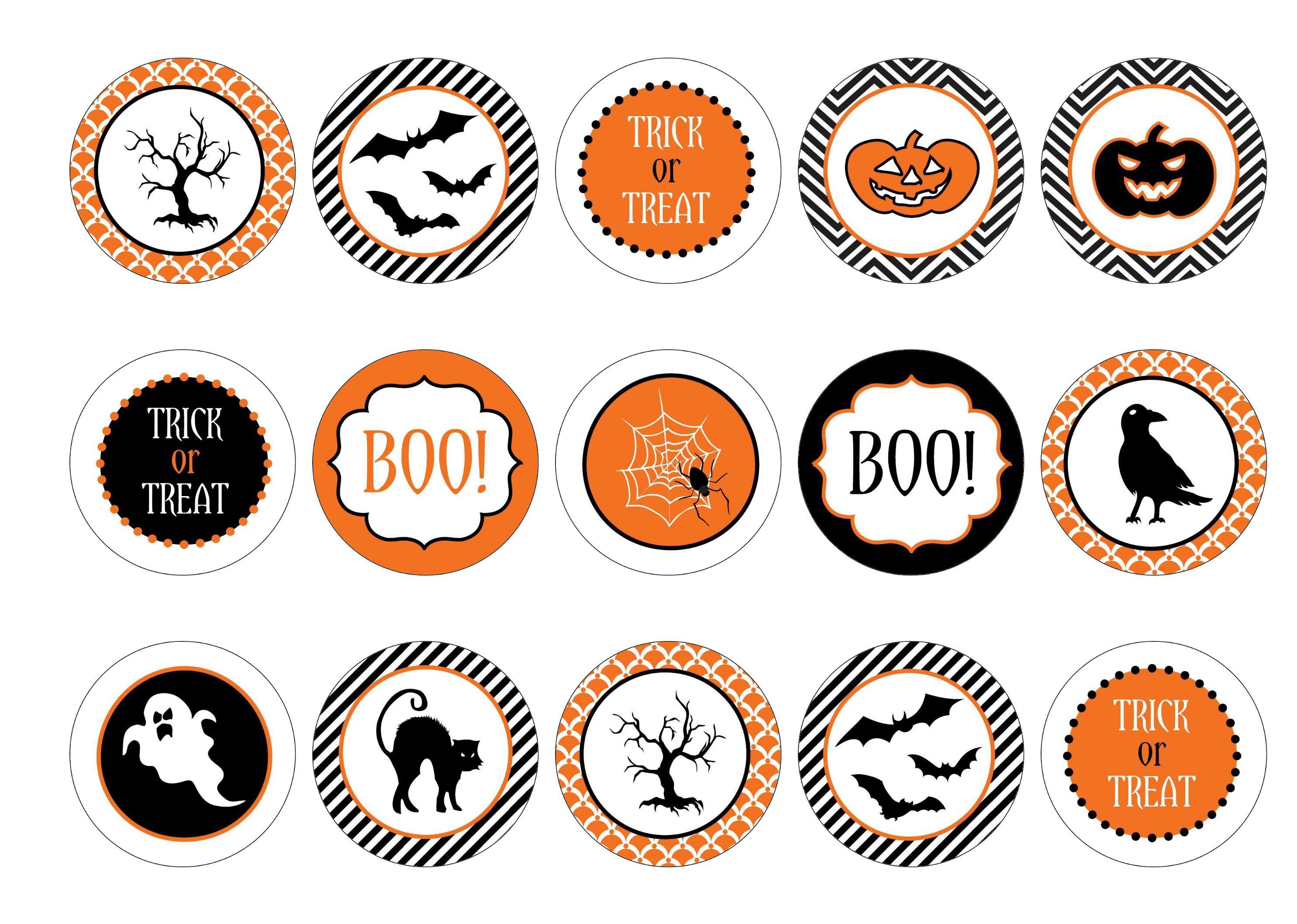 Printed cupcake toppers with black and orange Halloween images