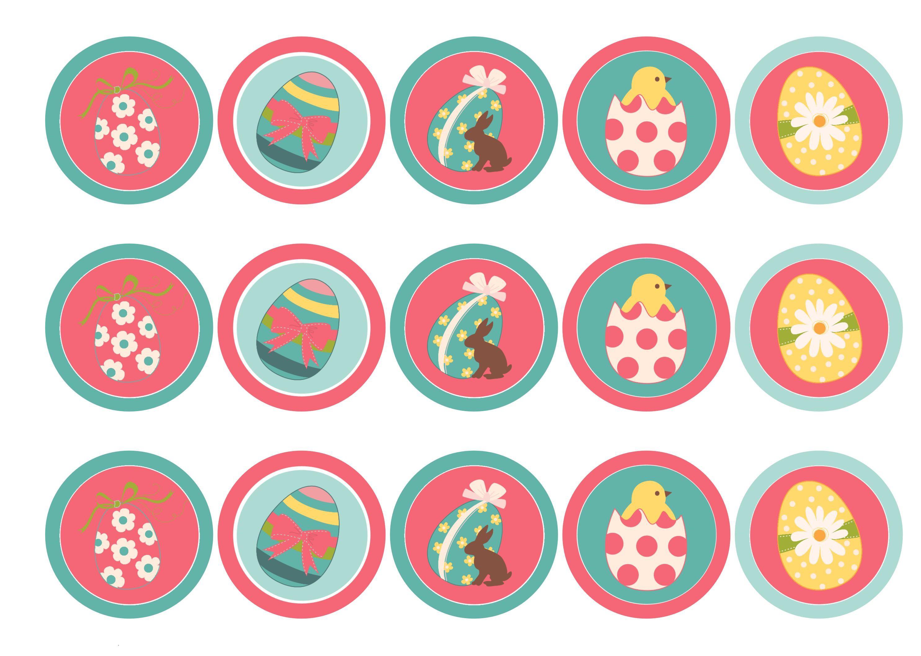 Edible cupcake toppers with pink and aqua Easter Egg designs