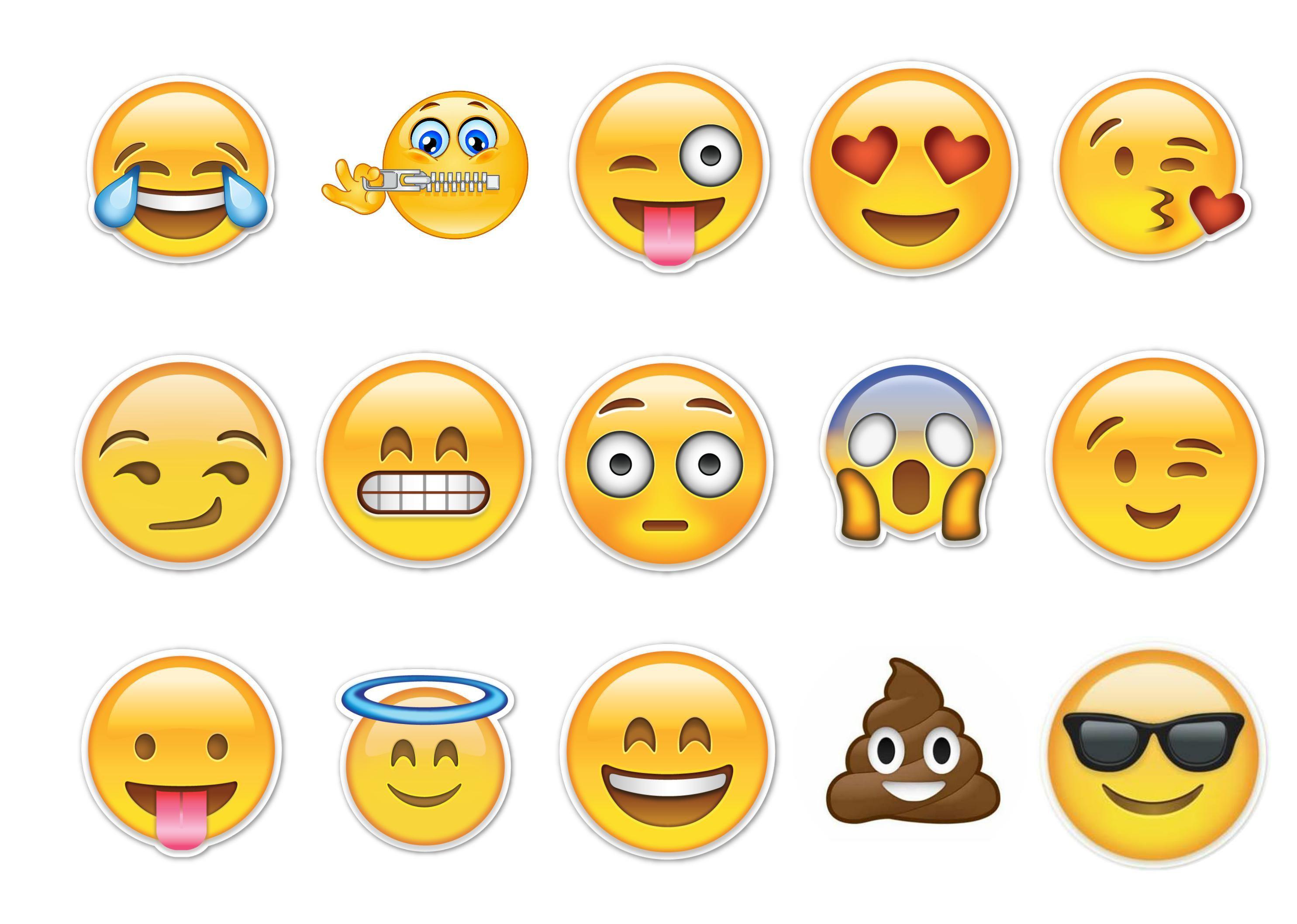 Printed cupcake toppers with mixed emoji / emoticon images