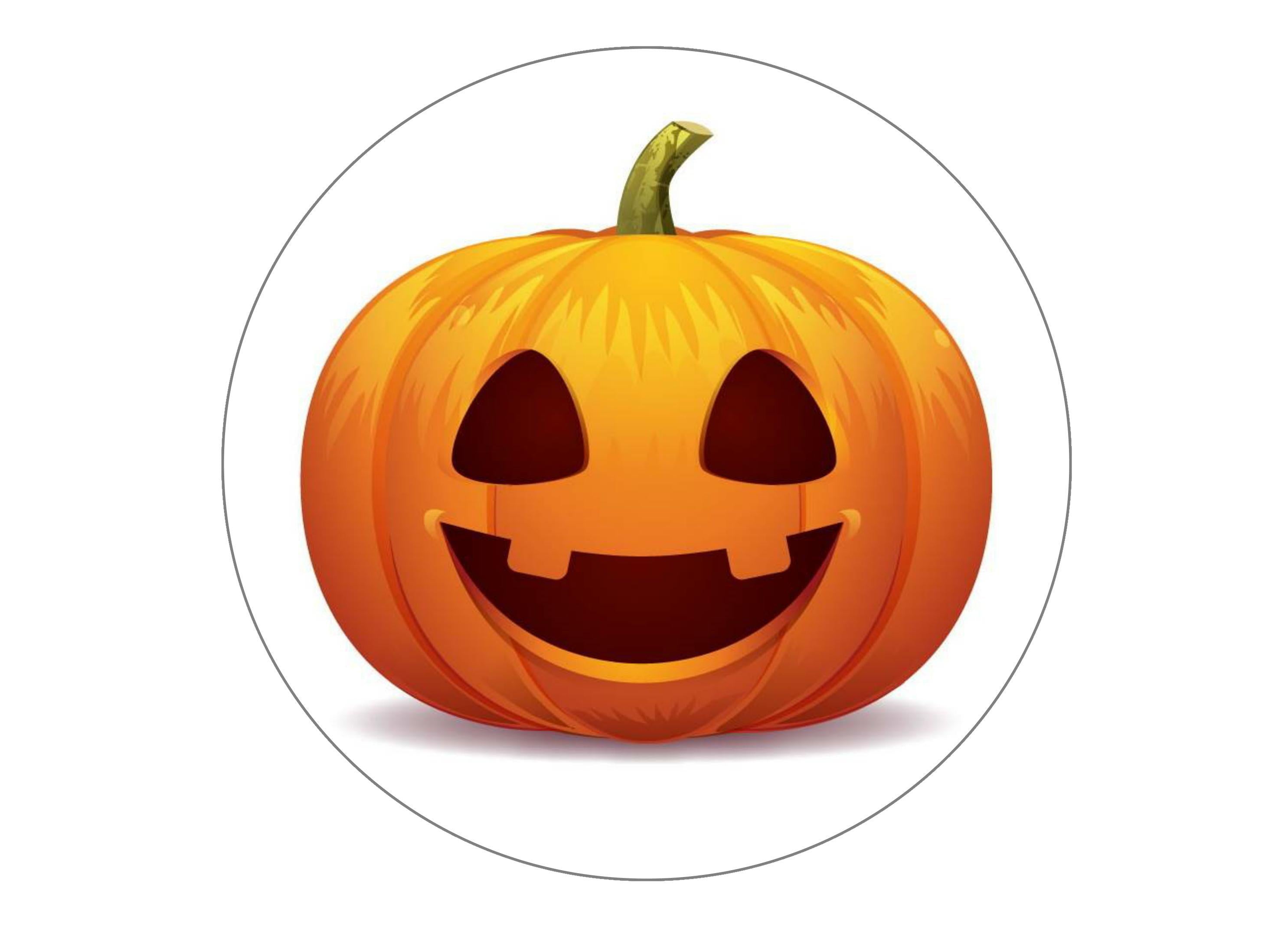 large printed cake topper with a halloween pumpkin face