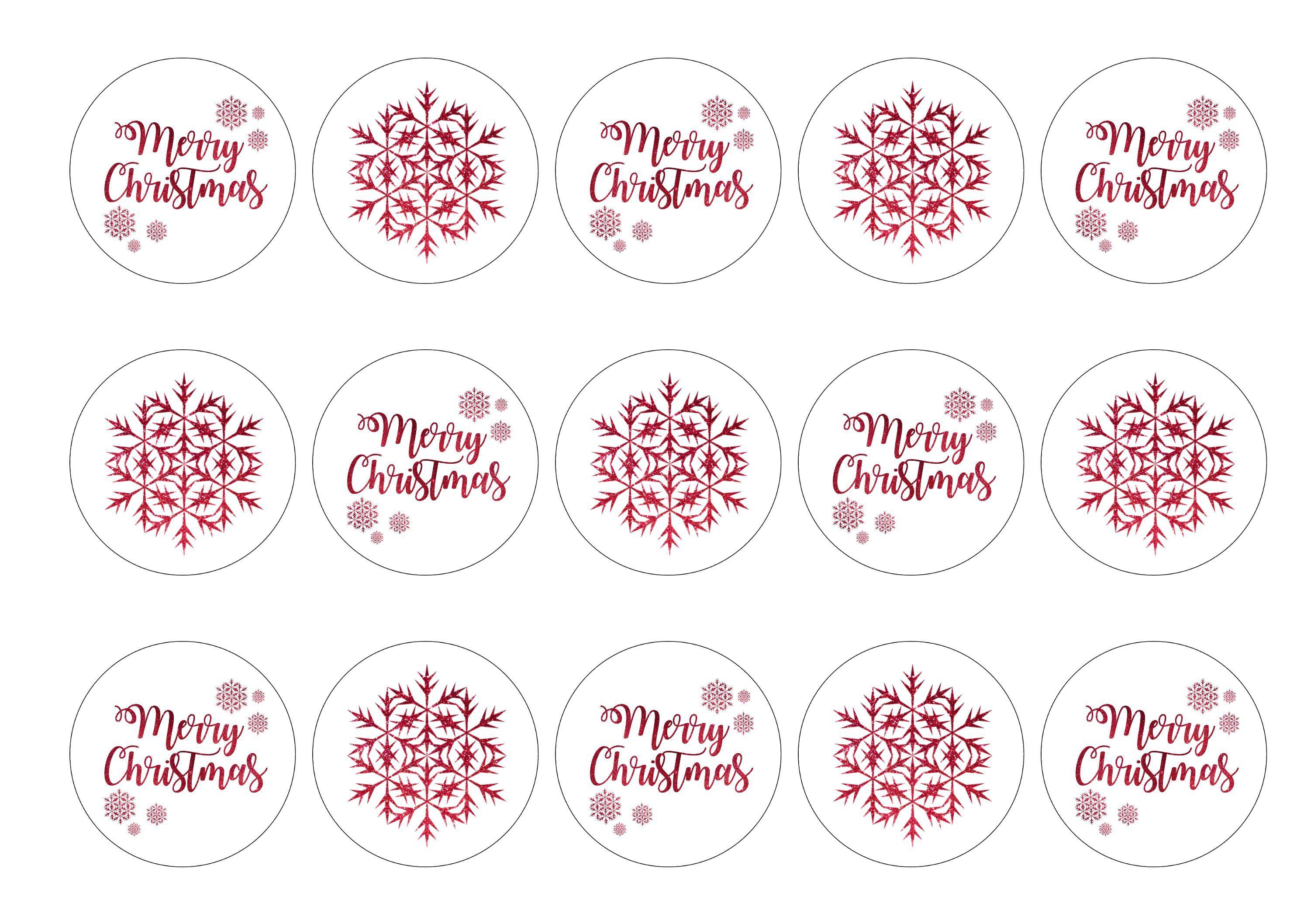 Printed cake toppers with a Merry Christmas message and red snowflakes.