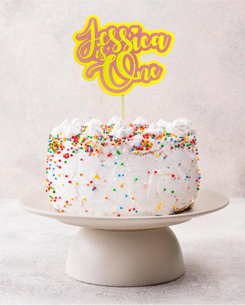 Jessica is One personalised cake topper in yellow and pink