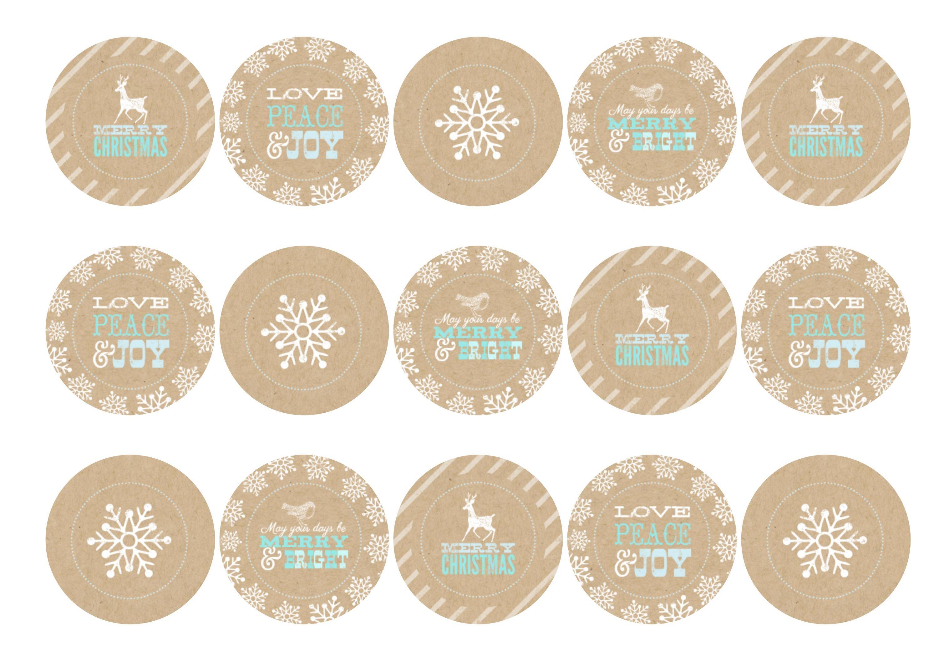 Printed cupcake toppers featuring Christmas designs in beige, white and blue