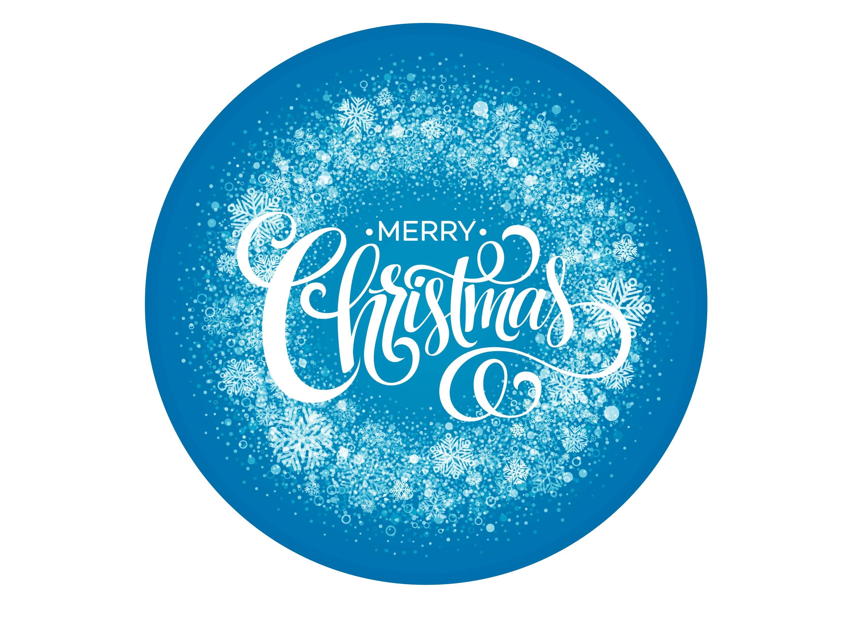 Large round cake topper with Merry Christmas message on a blue snowflake background