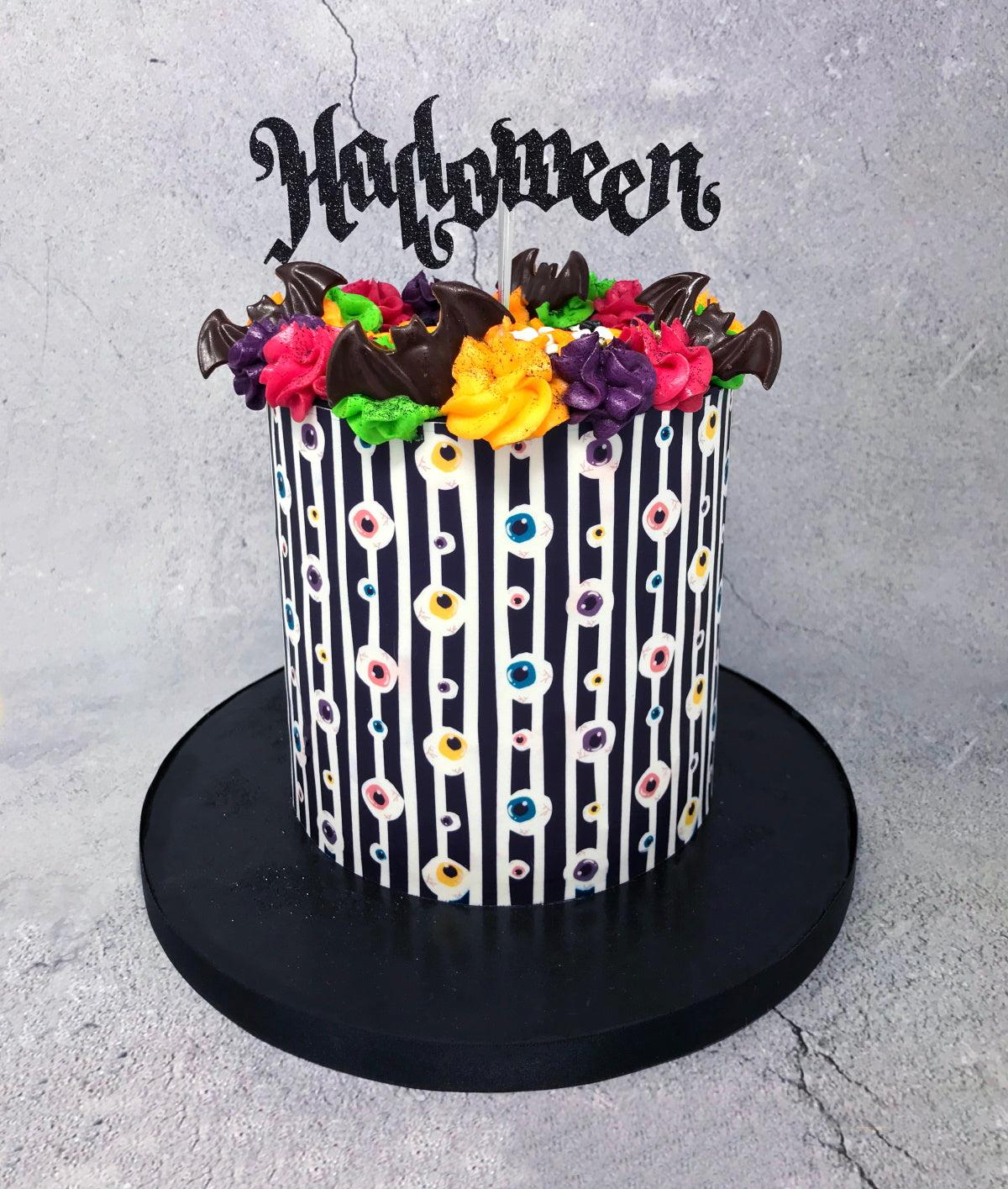 Tall Halloween Eyeball Cake with a printed cake wrap