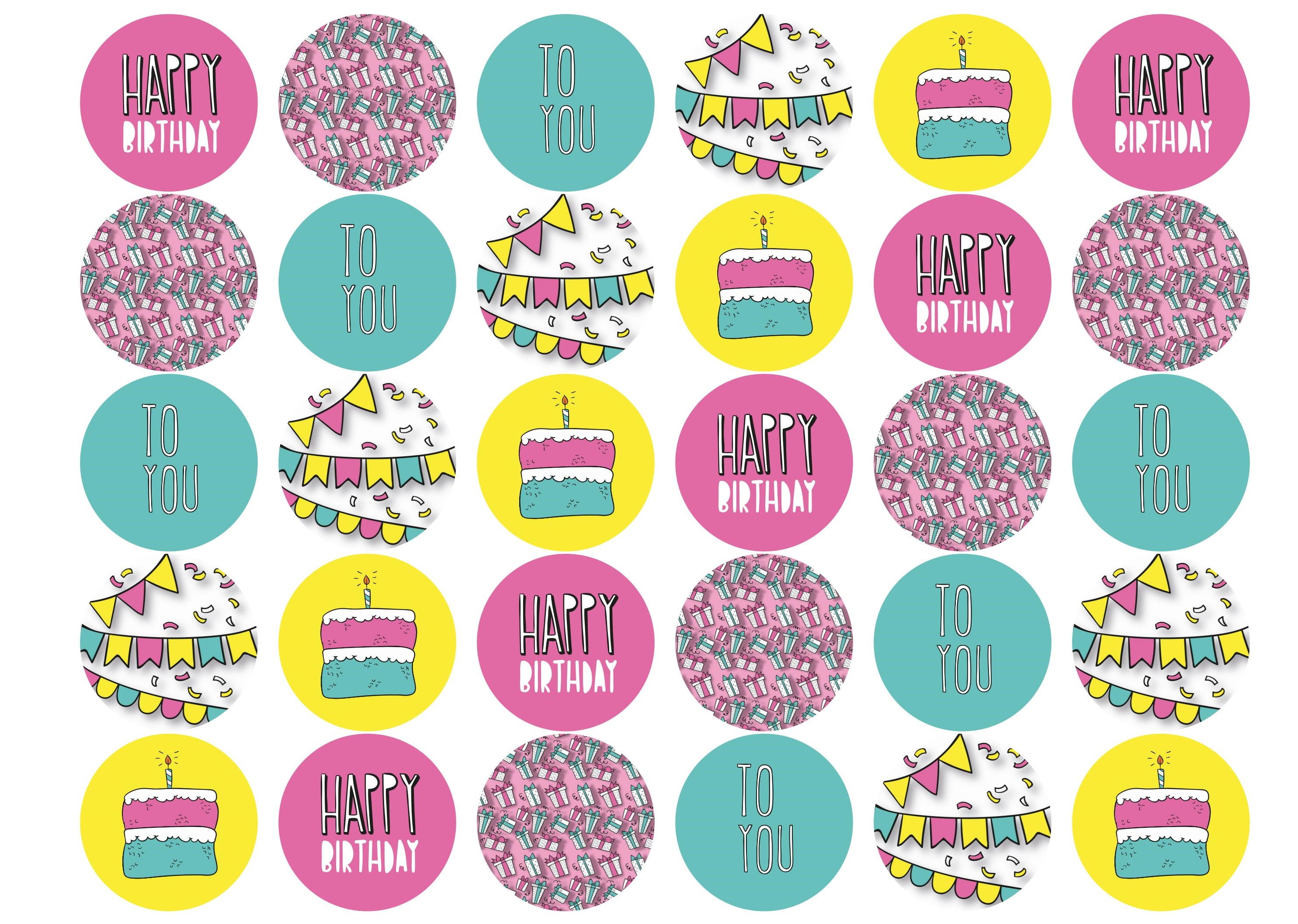 Edible cupcake toppers with mixed birthday designs in pink blue and yellow