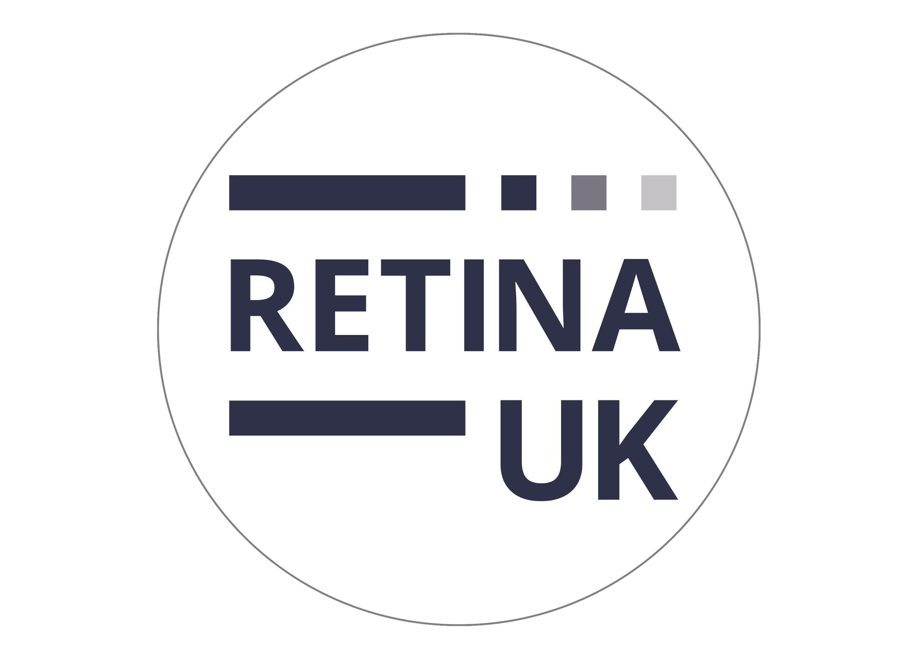 large round cake topper with the Retina UK logo
