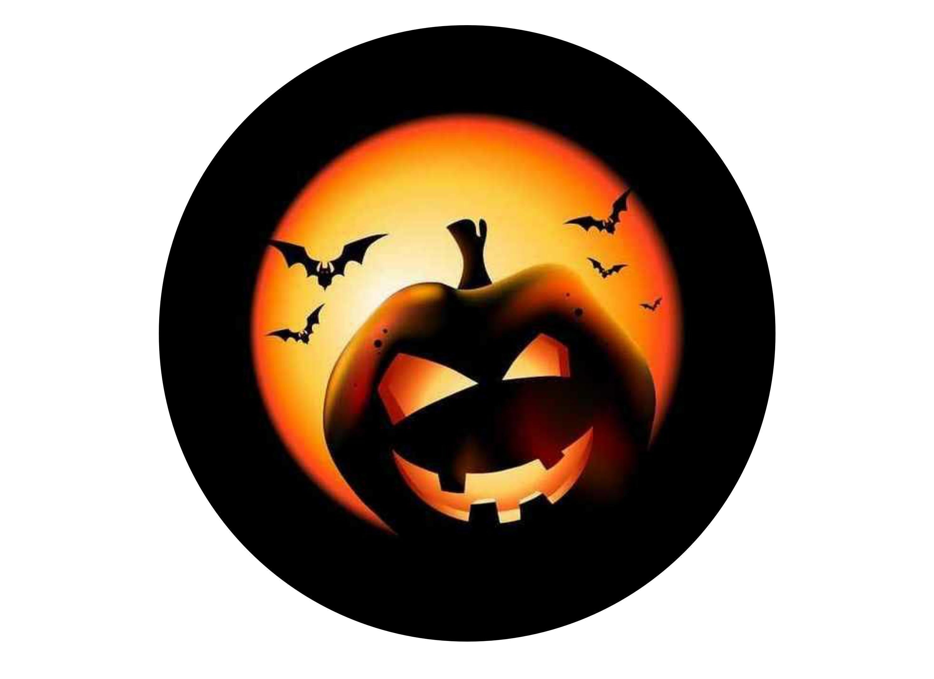 Large cake topper with a spooky pumpkin image for halloween